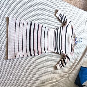 Mid sleeve skinny cuff neck thigh length dress.